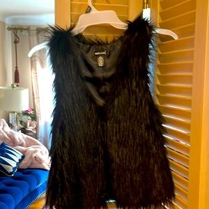black shaggy fur vest